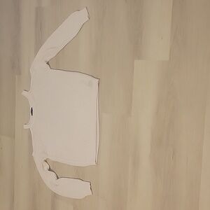 Cream-colored, peep-shoulder sweater